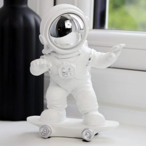 astronaut on skate board figurine 11x8x15cm
